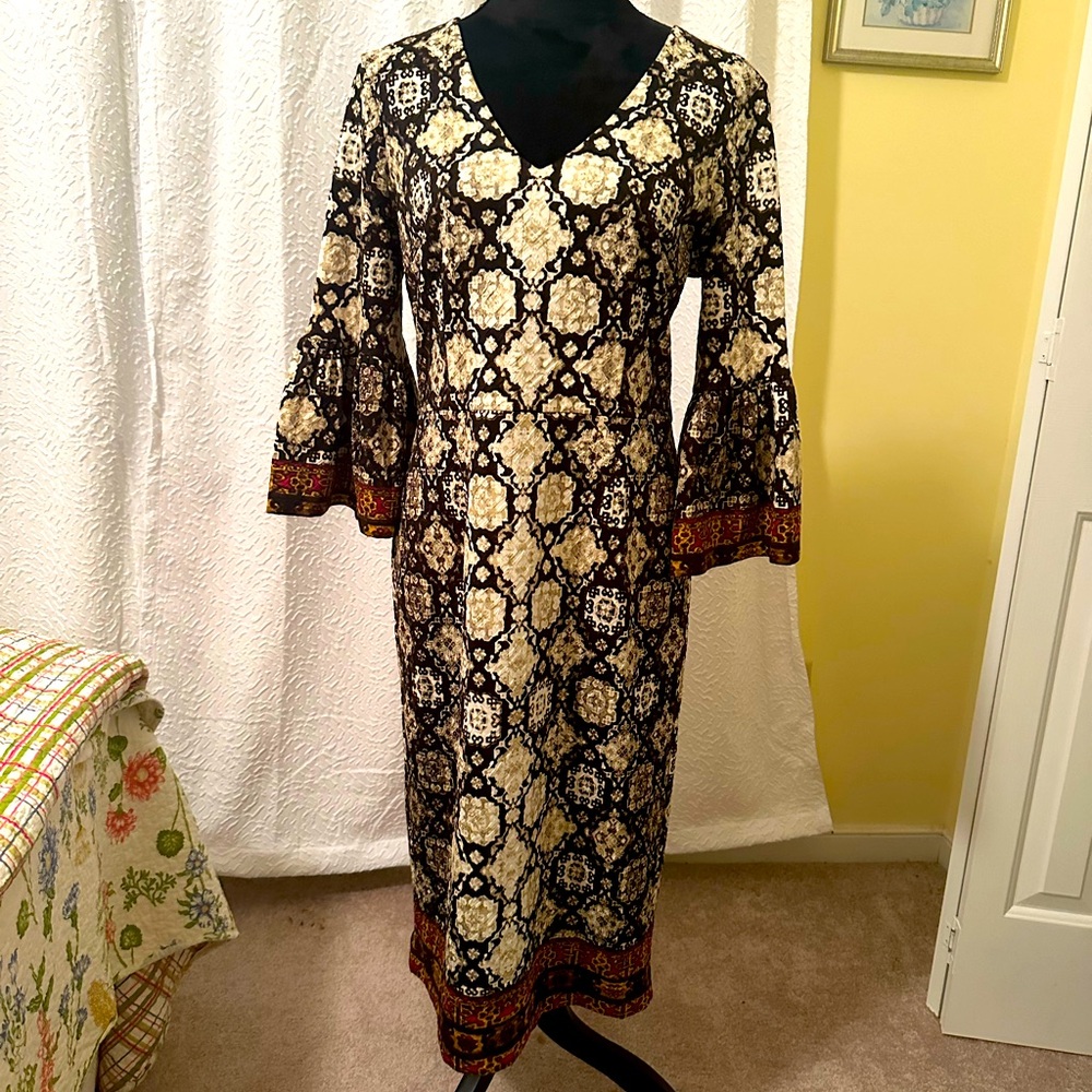 Beautiful dress in browns creams blacks a burgundy bell sleeve detail